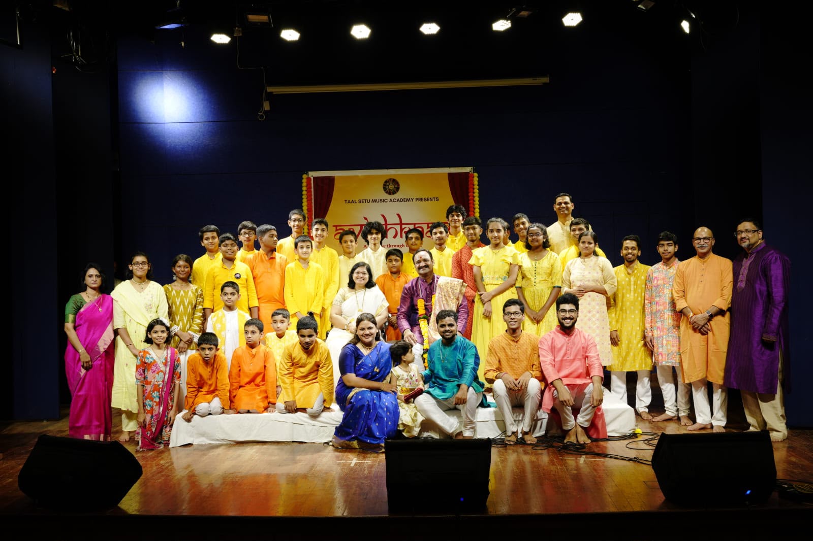 Students and teachers of Taalsetu Music Academy on stage at Avishkaar 2026